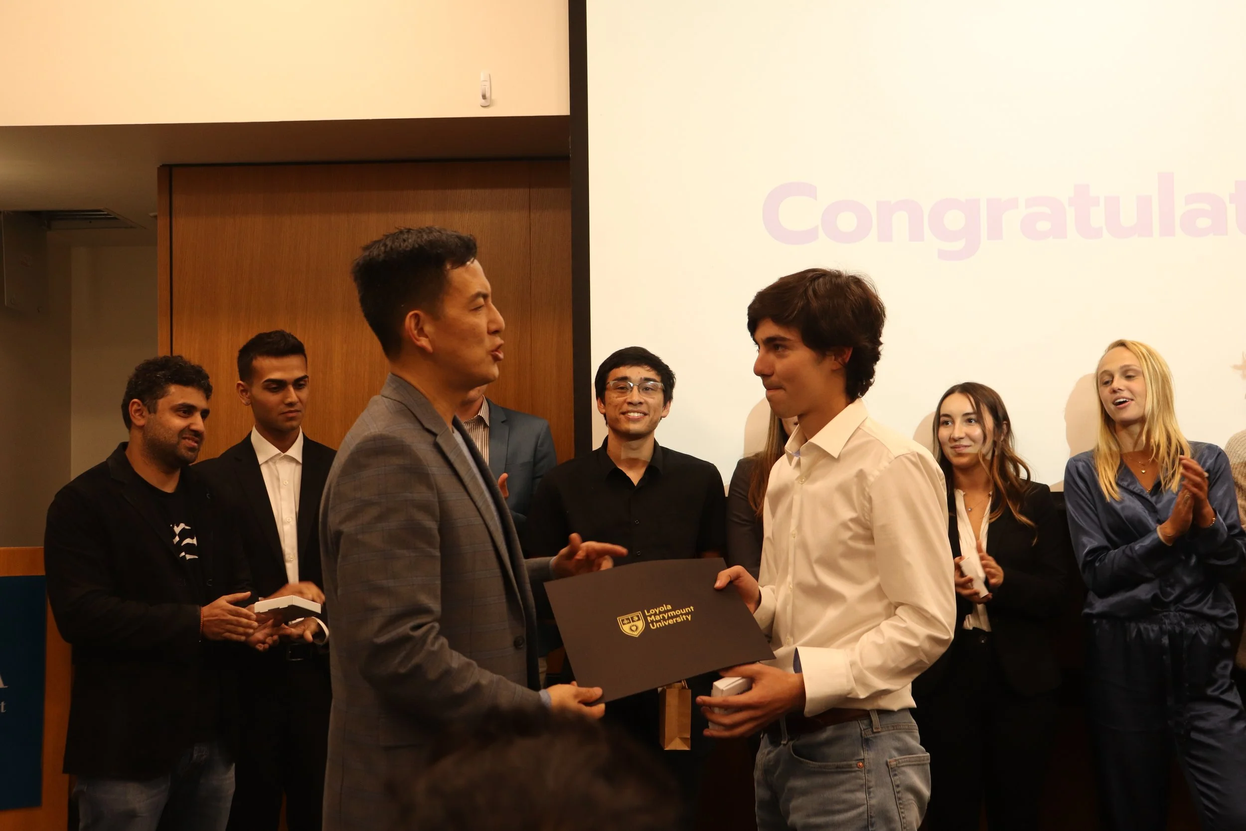 Steven Luis Howell receiving recognition at Loyola Marymount University